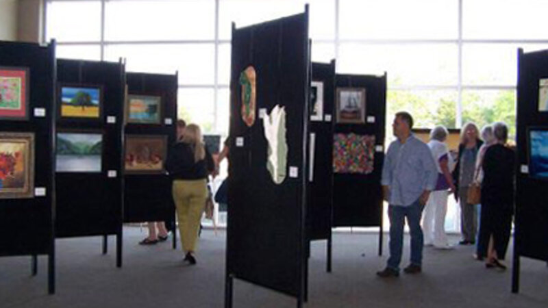 6th Annual Exhibit Attendees taking in the artwork on display for the 6th Annual NAP Exhibition for Central Louisiana Arts & Healthcare