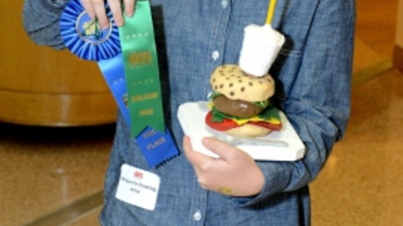 13th Annual Exhibit Yum