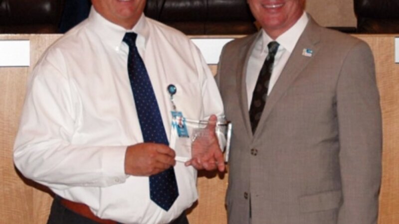 10th Annual Exhibit Coordinator Paul Wenzel accepting the NAP 10th Anniversary Award presented by Mayor Buddy Dyer