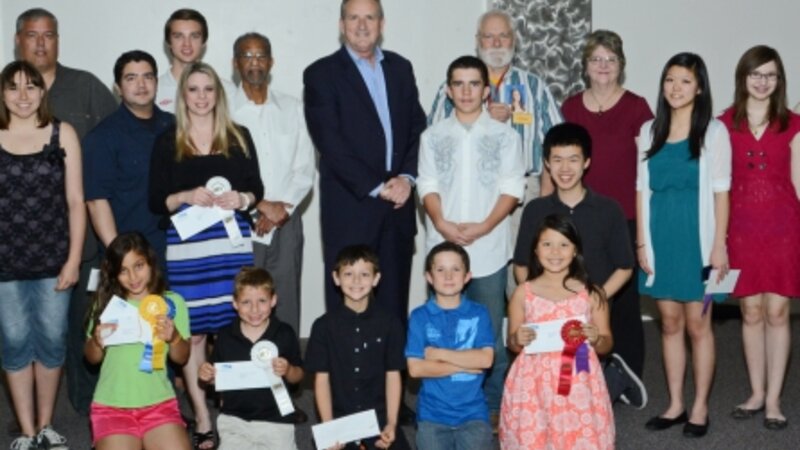 7th Annual Exhibit Award winners posed for a picture with DFW Airport CEO Jeff Fegan at the reception on May 7th.