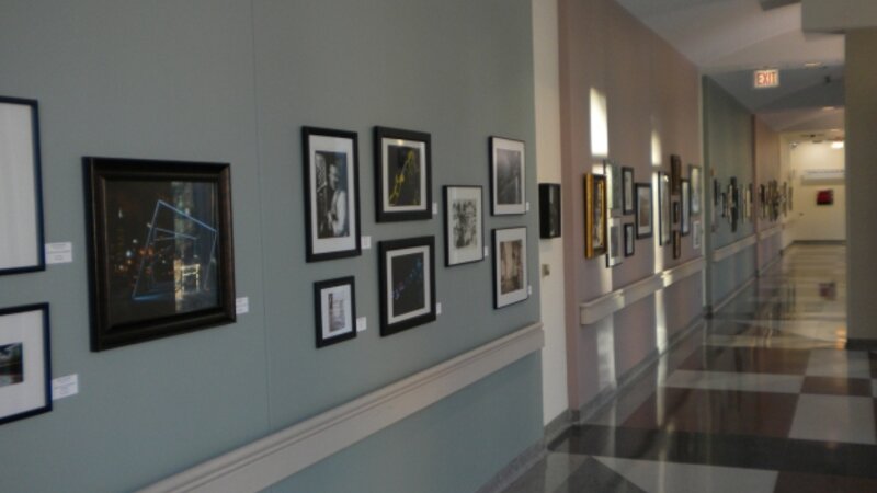 5th Annual Exhibit Artwork lining the hallway of the Connector Gallery
