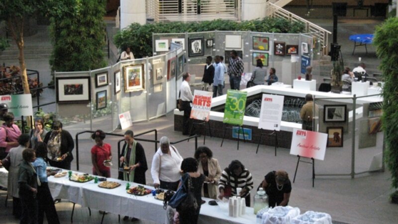 14th Annual Exhibit Attendees take in artwork and food at the 14th Annual Awards Reception in Fulton County