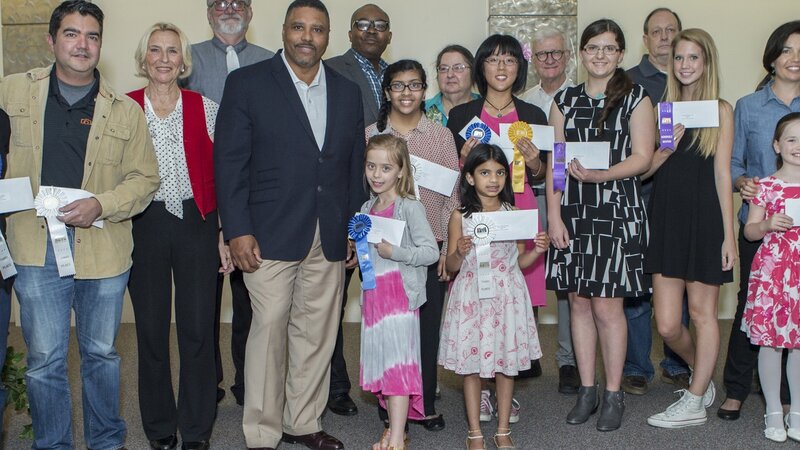 10th Annual Exhibit Award winners pose with Executive VP Kevin Buchanan at the awards reception at DFW