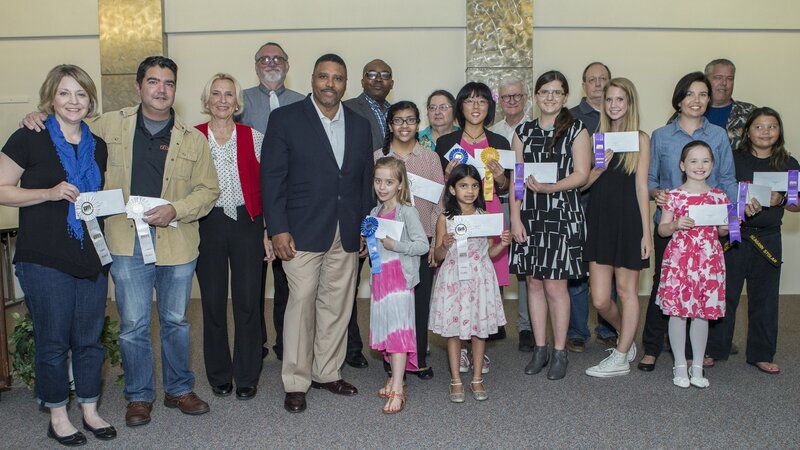 10th Annual Exhibit Award winners pose with Executive VP Kevin Buchanan at the awards reception at DFW