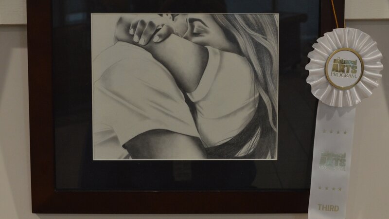 11th Annual Exhibit Saddened Comfort