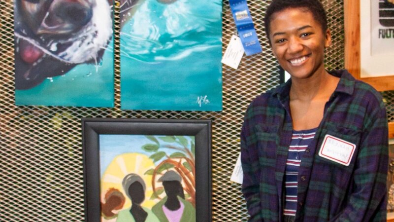 20th Annual Exhibit Dog in Water