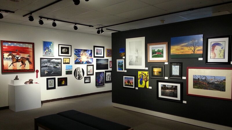 5th Annual Exhibit Walls of the Art Center/Gallery of Delaware State University full of wonderful employee art.