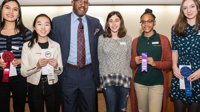 7th Annual Exhibit Teen winners posing with COO Walter Douglas at the awards reception.