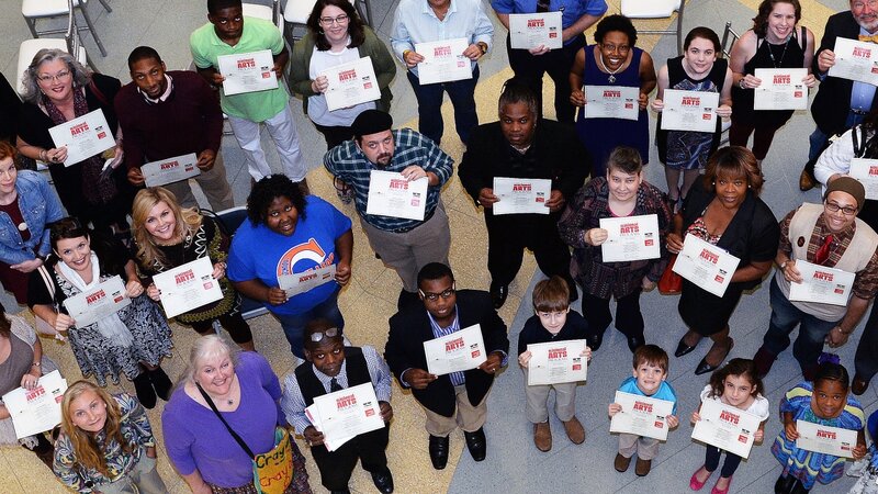 1st Annual Exhibit Award winners proudly displaying their certificates at the reception at the Tubman Museum
