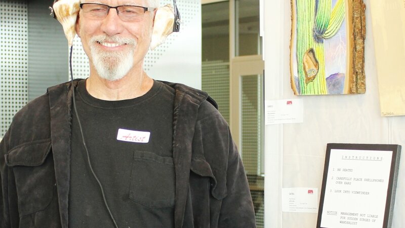 8th Annual Exhibit Shell Phone