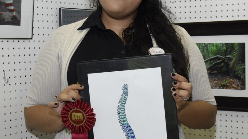 6th Annual Exhibit Spine