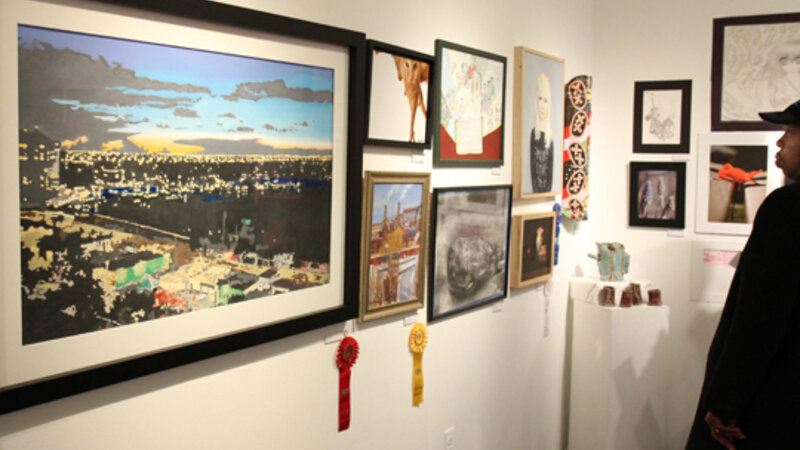 16th Annual Exhibit Admiring all the art on the walls of the Arts Collinswood Gallery