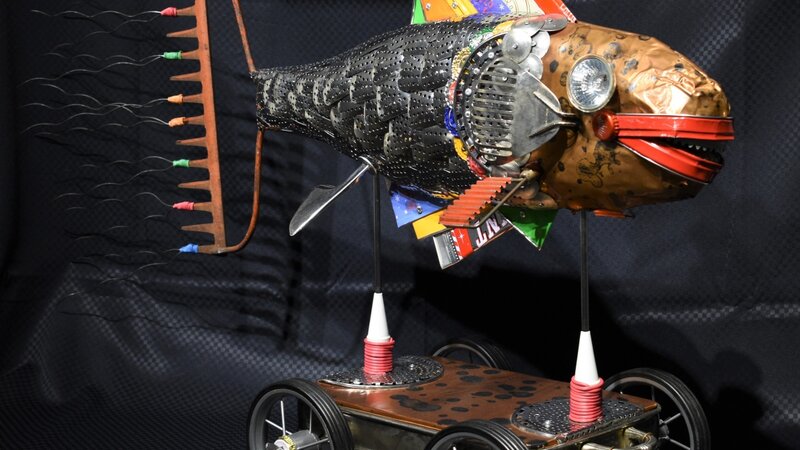 8th Annual Exhibit Woman Needs a Man Like a Fish Needs Wheels