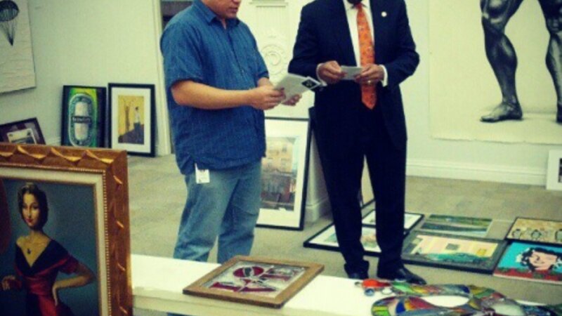 13th Annual Exhibit Mayor Nutter and City Hall Exhibitions Manager Tu Huynh reviews some of the details of the 2012 NAP Employee Exhibition.