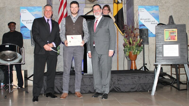 20th Annual Exhibit Benjamin Nicklow receives his First Place Award in the Amateur division.
