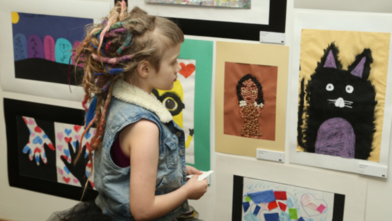 20th Annual Exhibit Taking in the youth artwork at the Cleveland show