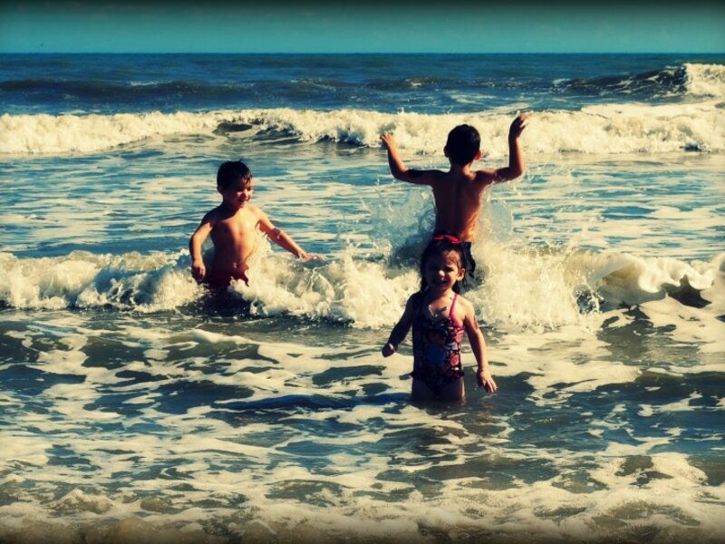 Children at the beach playing