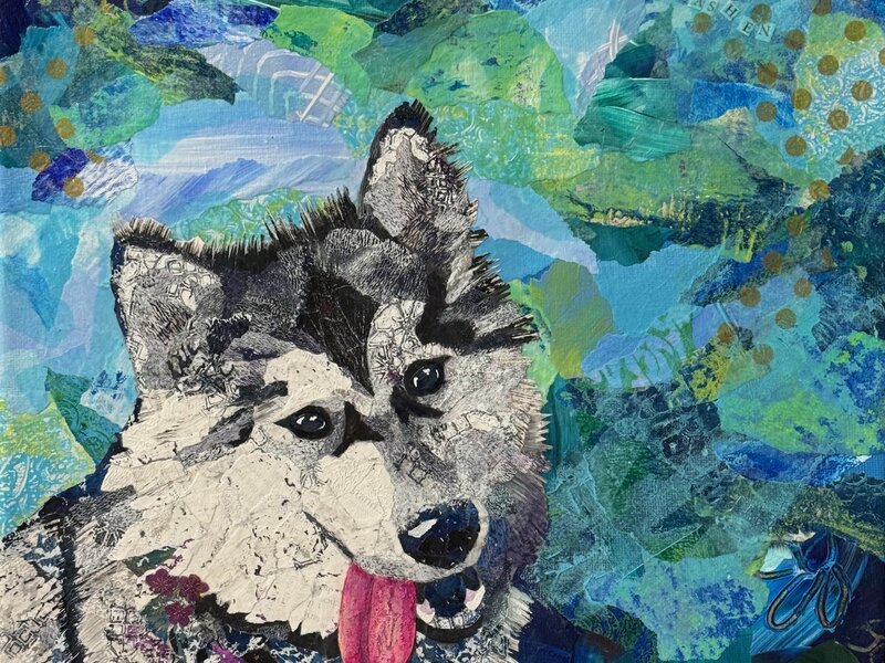 Mixed media torn-paper collage portrait of a black and white Malamute dog.  Abstract blue background.