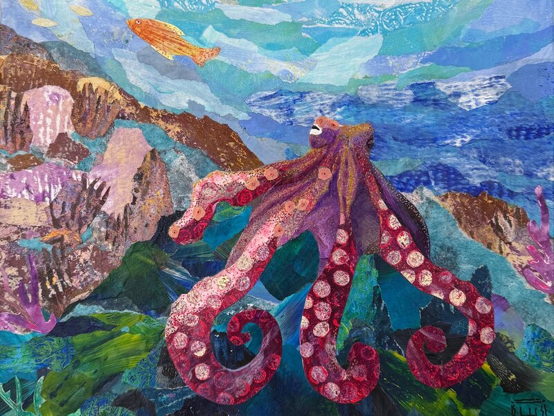 Mixed media torn-paper collage depicting a resting octopus on ocean rocks with coral and swimming fish in background.
