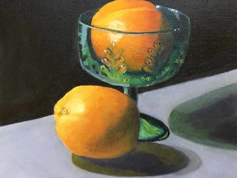 Oranges on a Stone Ledge