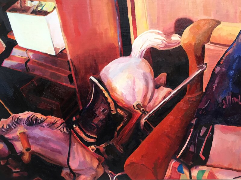 A cluttered basement with a white rocking horse thrown in the corner. The light is setting through a basement window. 