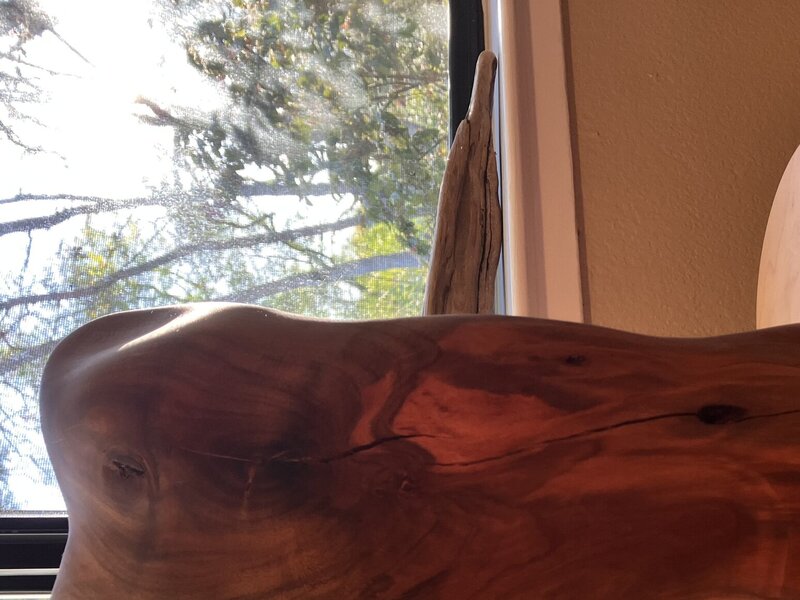 Abstract figure in almond wood