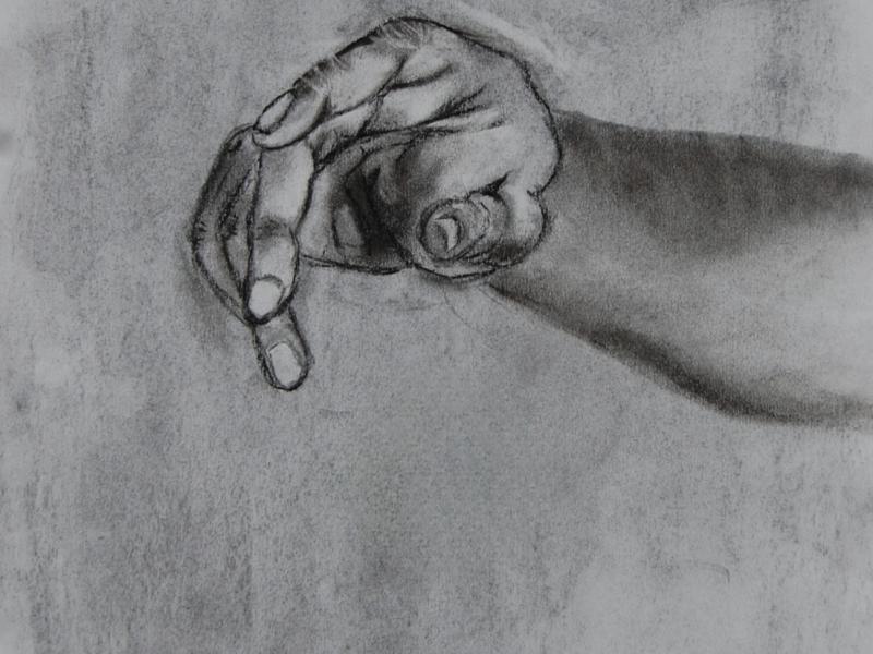 Charcoal drawing of a hand extended to the viewer, as if it is reaching for something.