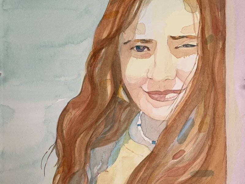 Portrait of a girl in bright sunlight