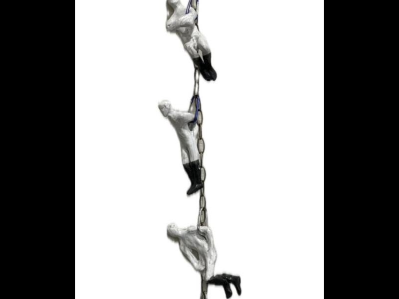 This series of hanging sculptures are on a chain showing emotional physical emotions