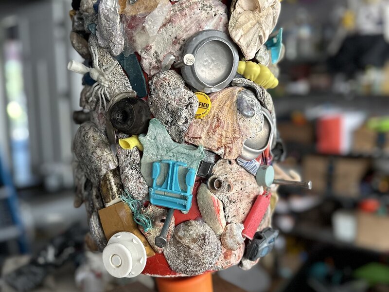 Buoy with attached debris