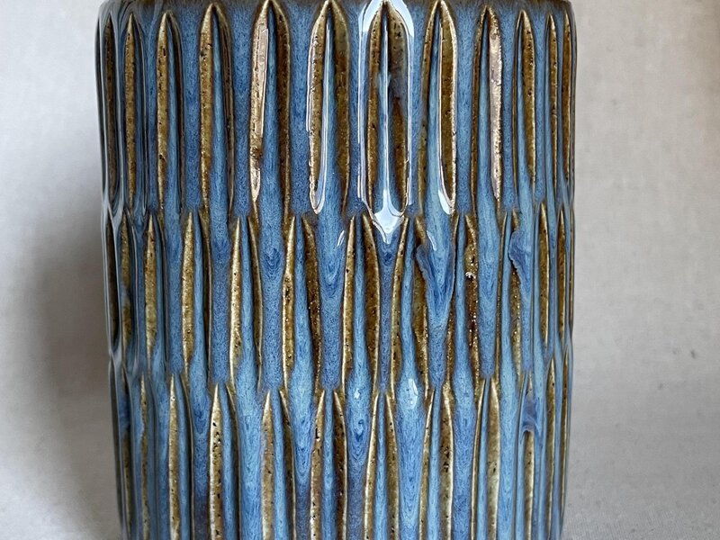 Carved ceramic vessel
