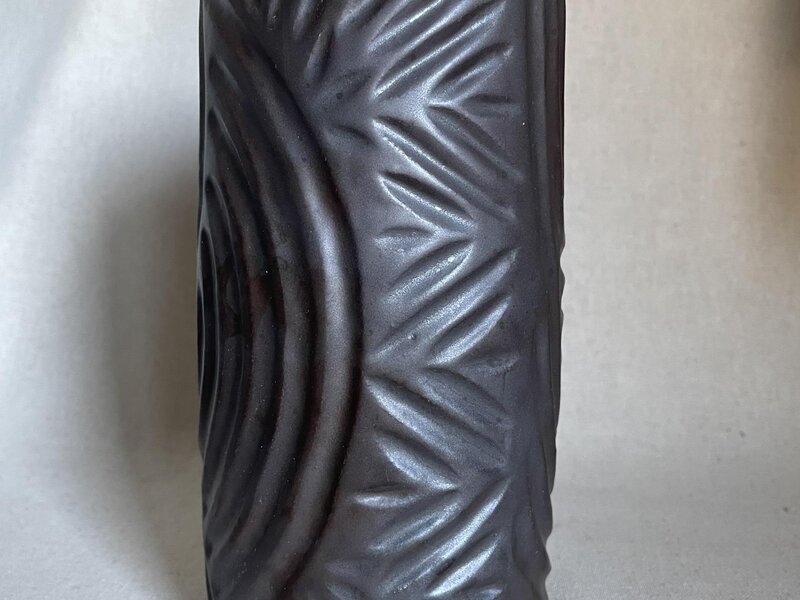 Carved ceramic vase. 