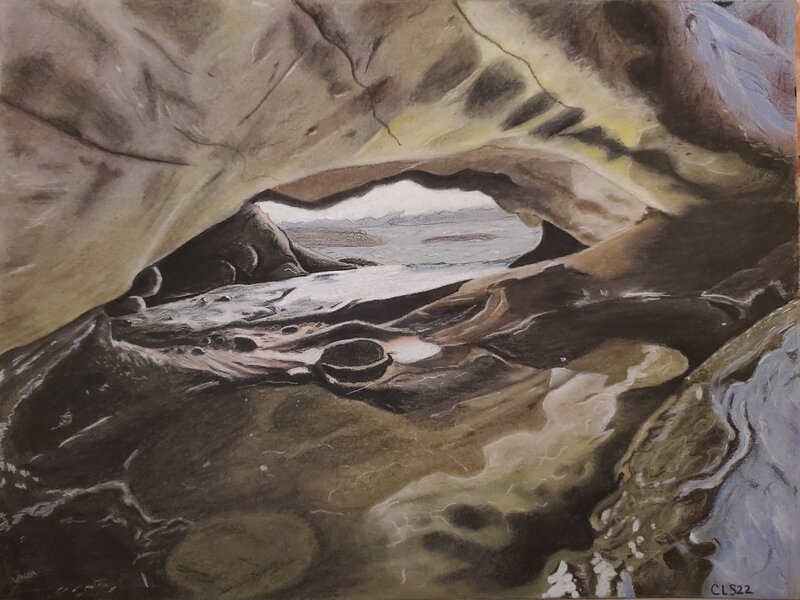 A scene zooming into the cavernous roots of a tree washed up on a beach. Inside the hollow we see a cave with a small glittering pool. Through the hole, distant rocky islands dot the horizon of the Pacific Ocean.