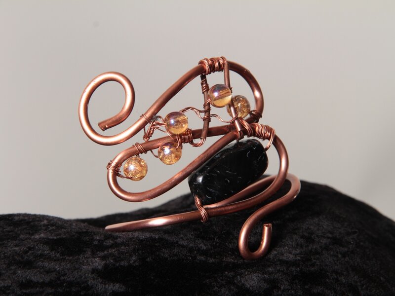 Wrapped wire and beads. Original designs .