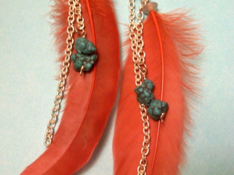 Red feather earrings