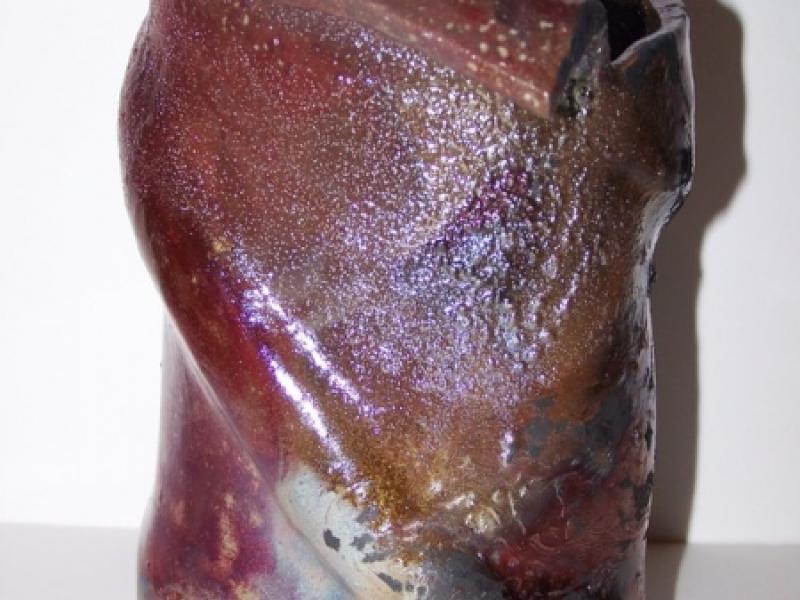 Copper glazed twist shaped vase