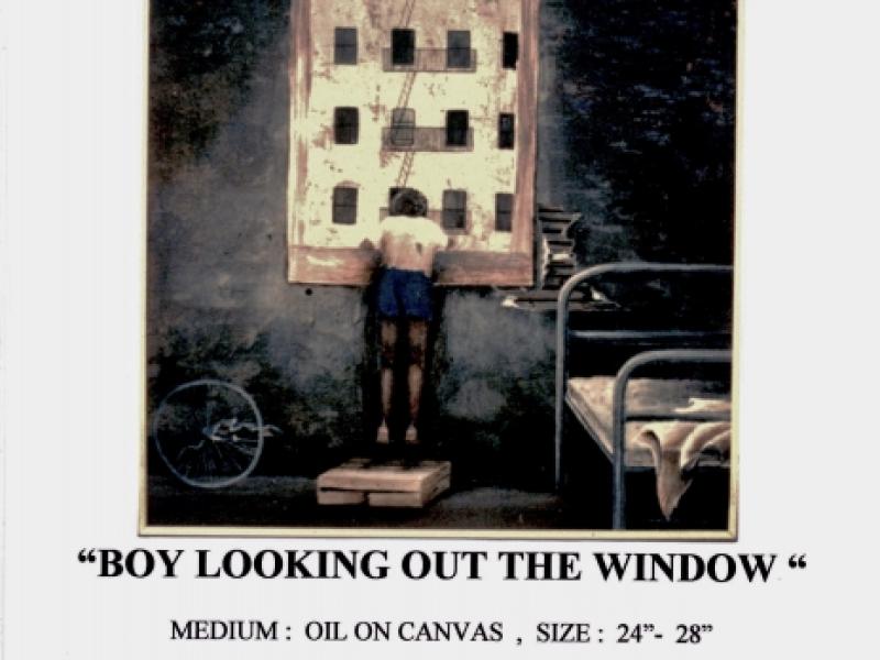 BOY LOOKING OUT THE WINDOW