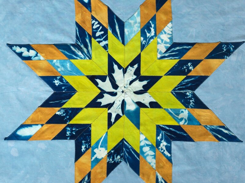 Lone star quilt pieces with hand dyed cotton and cyanotype prints