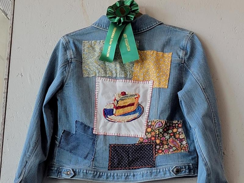 jean jacket with patchwork art education winner