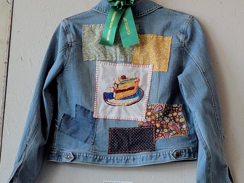 jean jacket with patchwork art education winner