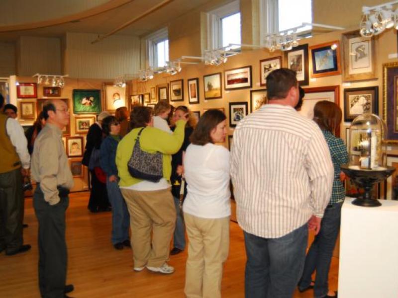 2nd Annual Exhibit People taking in the art at the awards reception.