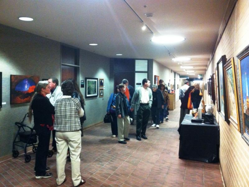 7th Annual Exhibit Visitors to the Salt Lake County Government Center taking in the artwork on display by employees and their family members