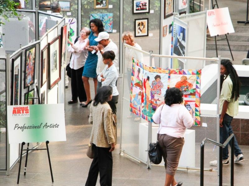 18th Annual Exhibit Attendees taking in the artwork on display in the Fulton County Government Center Atrium