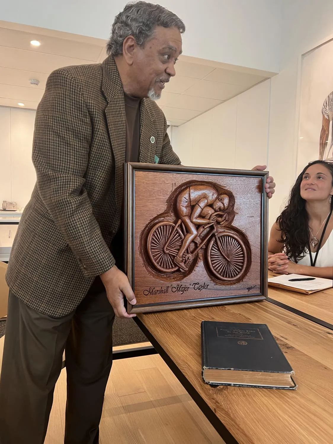 Me presenting/donating my mahogany carving of Marshall Walter (Major)Taylor to the International African American Museum in Charleston South Carolina