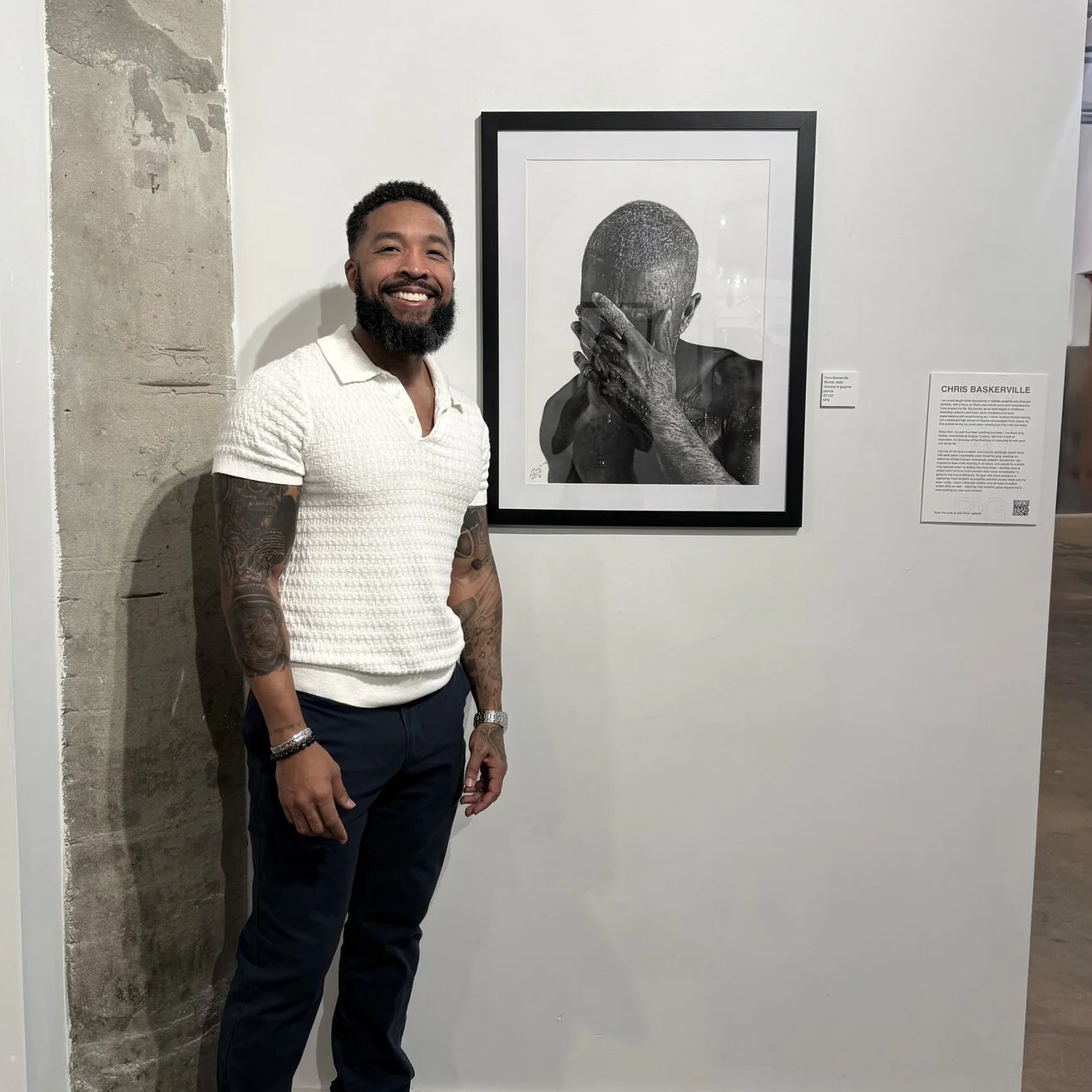 Chris Baskerville showcasing his latest charcoal portrait “Blonde”