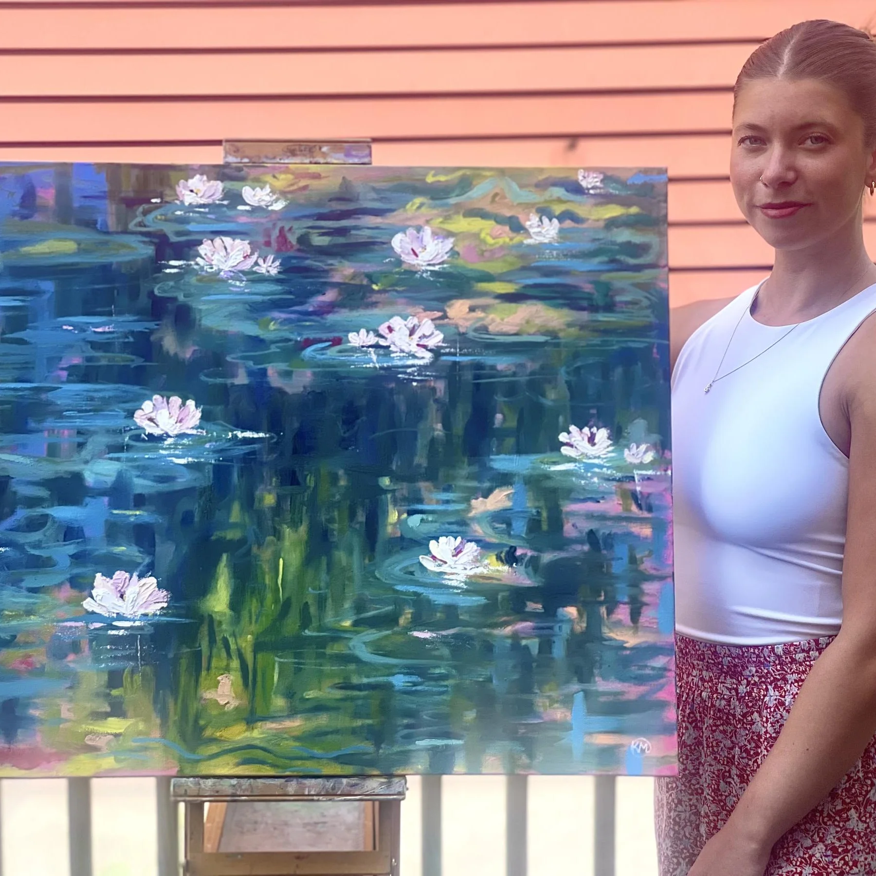 Artist pictured with painting