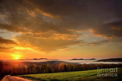 October Sunrise is a view from Phillips, Maine