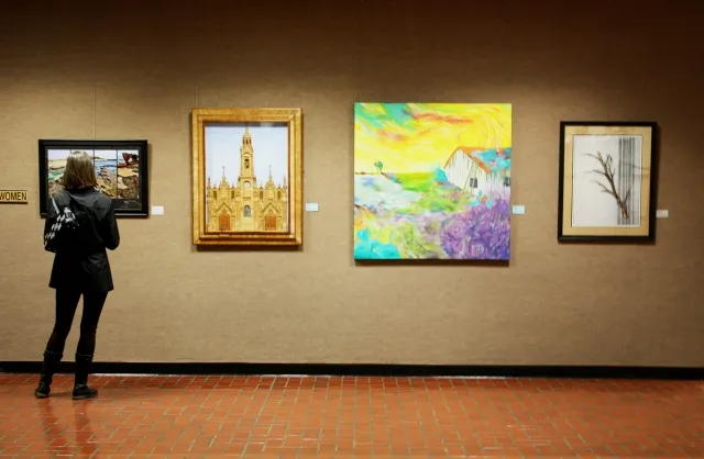 13th Annual Exhibit An attendee taking in a small section of artwork at the NAP exhibit in Ventura County