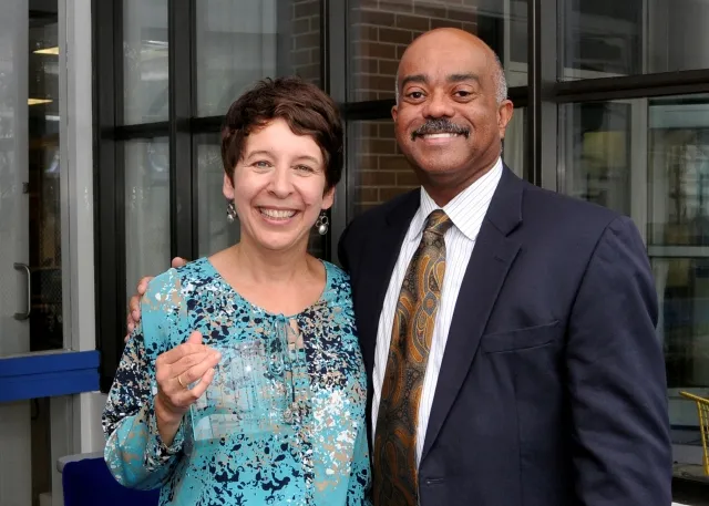 5th Annual Exhibit Coordinator Grace Serra was presented the NAP 5th Anniversary Award by President Herman Gray