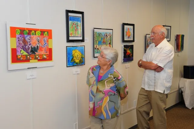 6th Annual Exhibit Attendees to the 6th Annual NAP Exhibition at DFW Airport taking in the wonderful artwork on display at the Rental Car Center